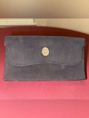 Black Evening Clutch with Gold Brooch Accent